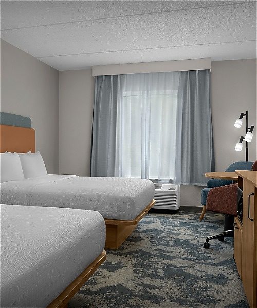 Two queen beds inside hotel room